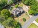 Aerial shot of a brick home, showcasing the roof, backyard, and driveway at 5247 Hayden Farms Dr, Powder Springs, GA 30127