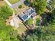 Overhead view of house with swimming pool, solar panels, and a beautiful backyard at 5247 Hayden Farms Dr, Powder Springs, GA 30127