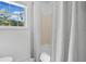 Bathroom featuring a tub/shower combination and a window providing natural light at 5247 Hayden Farms Dr, Powder Springs, GA 30127