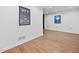 Bright bonus room with movie posters and wood laminate flooring would be perfect for entertaining at 5247 Hayden Farms Dr, Powder Springs, GA 30127
