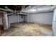 Unfinished basement offering great potential for customized renovations and additional living space at 1182 Demere Dr, Stone Mountain, GA 30083