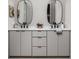 Modern bathroom featuring a double vanity with sleek countertops and stylish, rounded mirrors at 1230 Mado Loop, Chattahoochee Hills, GA 30268