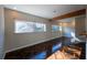 Living Room with lots of natural light, wooden floors, beam and view outside at 341 Little John Nw Dr, Lilburn, GA 30047