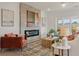 Cozy living room featuring stylish furniture, a modern fireplace, and elegant decor at 4818 Floydwood Ln, Mableton, GA 30126