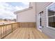The corner of a wooden patio attached to the home's exterior at 4818 Floydwood Ln, Mableton, GA 30126