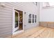 An open patio showing the interior through an open door and the exterior wall at 4818 Floydwood Ln, Mableton, GA 30126