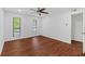 Bedroom with wood-look floors and two windows at 1301 Cumberland Se Ct, Smyrna, GA 30080