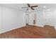 Spacious bedroom featuring wood-look floors, ceiling fan and two closets at 1301 Cumberland Se Ct, Smyrna, GA 30080