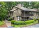 Charming condo with a private balcony surrounded by mature trees at 1301 Cumberland Se Ct, Smyrna, GA 30080