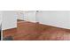 Bright living space with wood floors and large mirror at 1301 Cumberland Se Ct, Smyrna, GA 30080