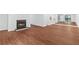 Spacious living area with wood floors, fireplace, and great natural light at 1301 Cumberland Se Ct, Smyrna, GA 30080
