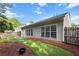 Secluded backyard with manicured lawn, privacy fence and patio is perfect for outdoor enjoyment at 2319 Alnwick Dr, Duluth, GA 30096