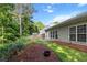 Backyard featuring grass, a fence, and lots of trees at 2319 Alnwick Dr, Duluth, GA 30096