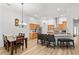Open concept kitchen featuring stainless steel appliances, a breakfast bar, and ample cabinet space, perfect for entertaining at 2319 Alnwick Dr, Duluth, GA 30096