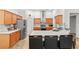 Modern kitchen with stainless steel appliances, granite countertops, and a convenient breakfast bar, blending style with functionality at 2319 Alnwick Dr, Duluth, GA 30096