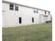 Spacious backyard with a large, well-maintained lawn, ideal for outdoor activities and relaxation at 2526 Piering Dr, Lithonia, GA 30038