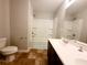 Clean bathroom with a double sink vanity, tub-shower combo, and modern fixtures at 2526 Piering Dr, Lithonia, GA 30038