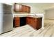 Well-organized kitchen featuring essential appliances and wood cabinets for practical storage at 2526 Piering Dr, Lithonia, GA 30038