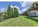 Spacious, well-maintained backyard featuring lawn and landscape at 3910 Cameron Ct, Cumming, GA 30040