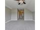 Expansive bonus room with plush carpeting and a ceiling fan at 3910 Cameron Ct, Cumming, GA 30040