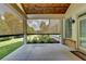 Covered patio featuring privacy screens, wood ceiling, and access to the backyard at 3910 Cameron Ct, Cumming, GA 30040