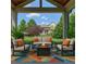 Relaxing outdoor seating on patio with a fire pit at 3910 Cameron Ct, Cumming, GA 30040