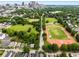 An aerial view of a residential neighborhood including a park with baseball and track fields at 472 Martin Se St # 10, Atlanta, GA 30312