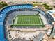 Aerial shot of a blue stadium boasting modern amenities surrounded by downtown cityscape at 472 Martin Se St # 10, Atlanta, GA 30312