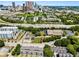 Aerial view of real estate featuring lush greenery, roadways, and the Atlanta skyline at 472 Martin Se St # 10, Atlanta, GA 30312