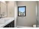 Bathroom featuring modern vanity, square sink, framed mirror, towel rack, and toilet at 472 Martin Se St # 10, Atlanta, GA 30312