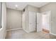 Neutral bedroom with light walls, soft carpet and doors leading to another room at 472 Martin Se St # 10, Atlanta, GA 30312