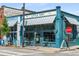 Quaint blue cafe exterior with awning and outdoor seating offering a welcoming neighborhood vibe at 472 Martin Se St # 10, Atlanta, GA 30312