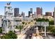 Panoramic cityscape view of Atlanta with Olympic Rings pedestrian bridge under bright blue skies at 472 Martin Se St # 10, Atlanta, GA 30312
