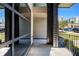 Modern doorway with large windows provides bright, natural light and offers a sleek, inviting entrance at 472 Martin Se St # 10, Atlanta, GA 30312