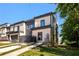 Charming townhome featuring a well-manicured lawn, private entrance, and contemporary architectural design at 472 Martin Se St # 10, Atlanta, GA 30312