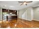 Open-concept living area with hardwood floors, modern kitchen, and plenty of natural light at 472 Martin Se St # 10, Atlanta, GA 30312