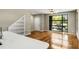 Bright living space with hardwood floors, modern design, and large window offering great views at 472 Martin Se St # 10, Atlanta, GA 30312