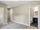 Spacious main bedroom featuring neutral walls and an ensuite bathroom at 472 Martin Se St # 10, Atlanta, GA 30312