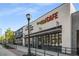 Exterior view of a vibrant retail space featuring Tropical Cafe with modern design elements and storefront windows at 472 Martin Se St # 10, Atlanta, GA 30312