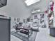 Bonus room featuring a comfortable seating area, skylights, carpeting, and personalized wall decor at 5605 Waters Edge Trl, Roswell, GA 30075