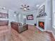 Living room featuring hardwood floors and a fireplace at 5605 Waters Edge Trl, Roswell, GA 30075