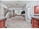 Beautiful main bathroom with soaking tub, walk-in shower, and tile floors at 5605 Waters Edge Trl, Roswell, GA 30075