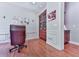 Stylish office with built-in storage, hardwood floors, and bright natural light at 5605 Waters Edge Trl, Roswell, GA 30075