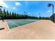 A view of the community tennis court on a sunny day, a great amenity for residents at 5605 Waters Edge Trl, Roswell, GA 30075