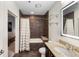 The full bath has a shower and tub combination, granite counters, and a lighted vanity mirror at 1080 Peachtree Ne St # 608, Atlanta, GA 30309