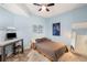 Cozy bedroom with a ceiling fan, large mirror and desk, offering a relaxing private space at 1080 Peachtree Ne St # 608, Atlanta, GA 30309
