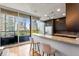 Well-appointed kitchen with granite countertops, stainless steel appliances, and a view of the city at 1080 Peachtree Ne St # 608, Atlanta, GA 30309