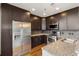 Gourmet kitchen featuring stainless steel appliances, ample storage, and granite countertops at 1080 Peachtree Ne St # 608, Atlanta, GA 30309