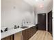 A convenient kitchenette offers granite countertops, sleek cabinets, and modern stainless steel appliances at 1080 Peachtree Ne St # 608, Atlanta, GA 30309