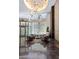 Contemporary lobby with high ceilings, unique lighting, comfortable seating, and elegant finishes at 1080 Peachtree Ne St # 608, Atlanta, GA 30309